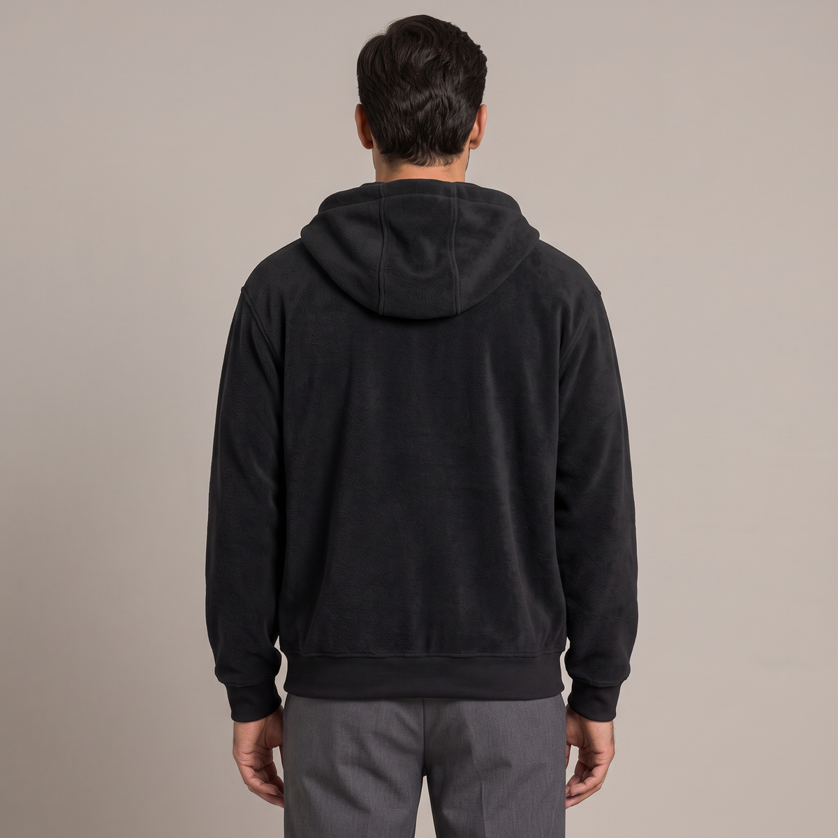 Men's black zip-up hoodie, back view with the hood lying flat
