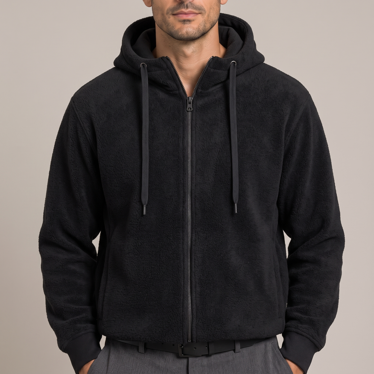 Close detail of the zip, hood and drawcords on the black brushed fleece hoodie
