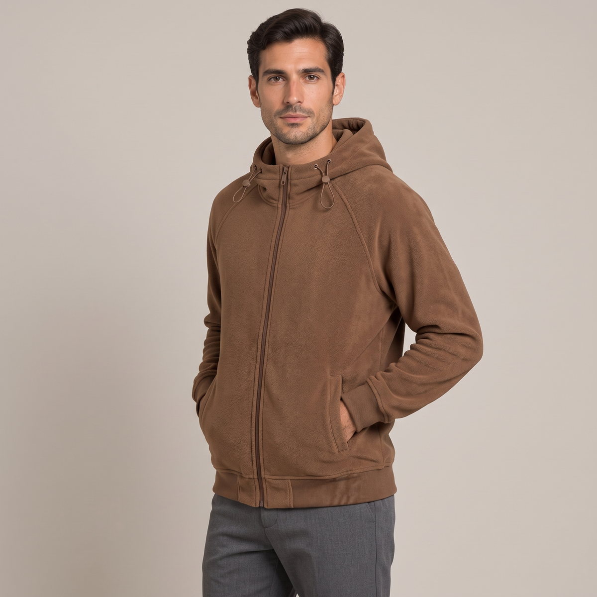 Men's brown zip-up hoodie, three-quarter view with hands in pockets