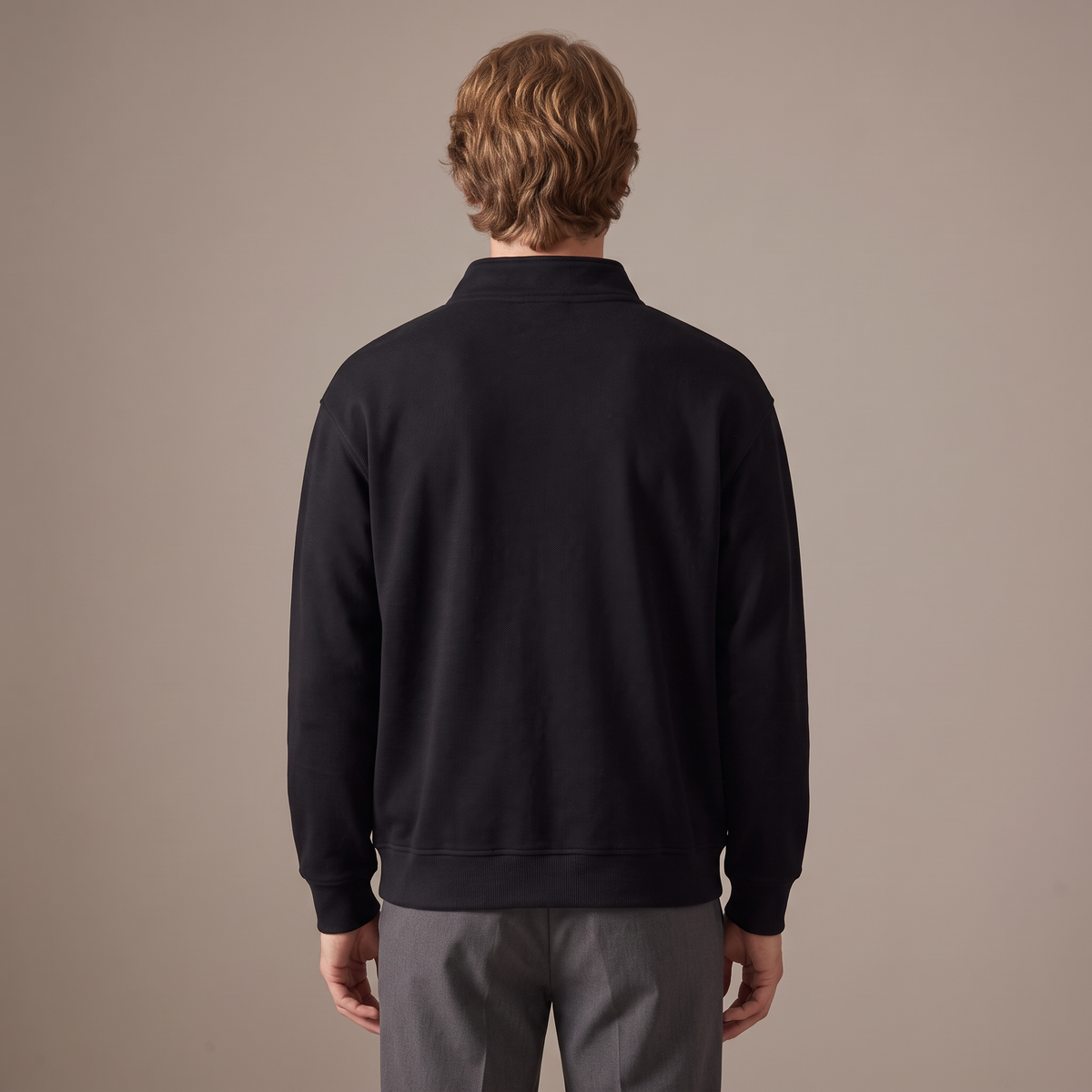 Men's black half-zip pique sweatshirt, back view