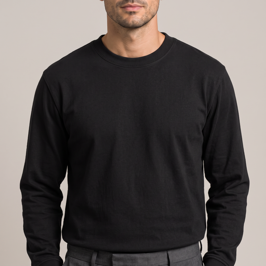 Close detail of the ribbed crew neck on the combed cotton long sleeve t-shirt, in black