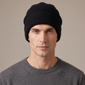Men's black thickened wool beanie worn, front view