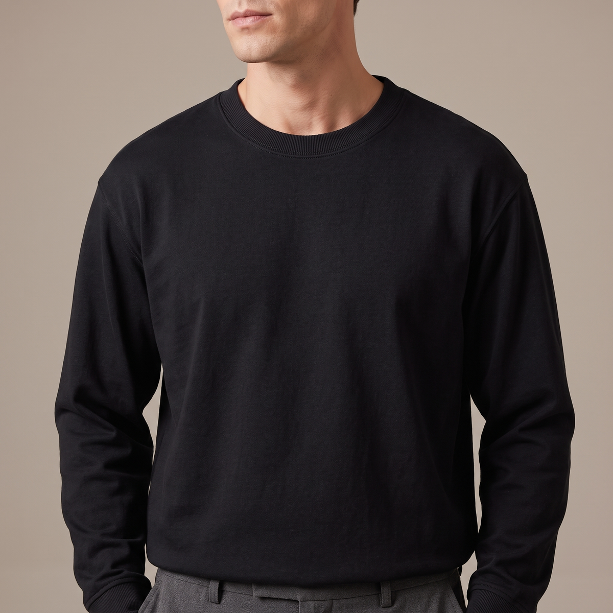 Close detail of the ribbed crew neck on the 240gsm heavy cotton long sleeve t-shirt, in black