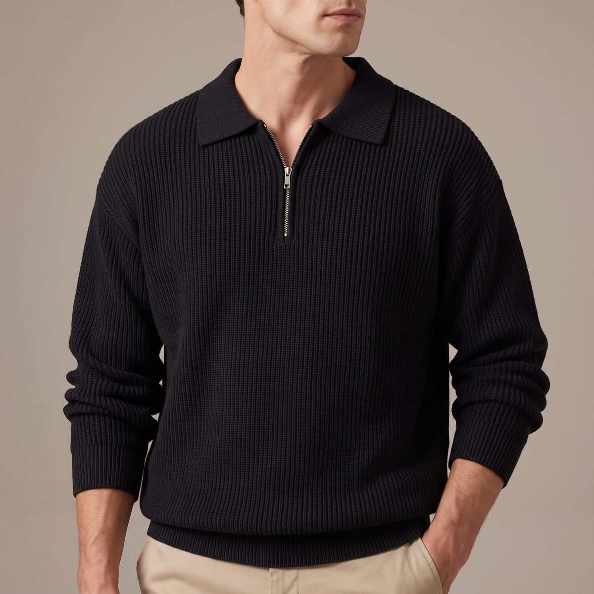 Close-up of the half-zip placket and knit texture, in black