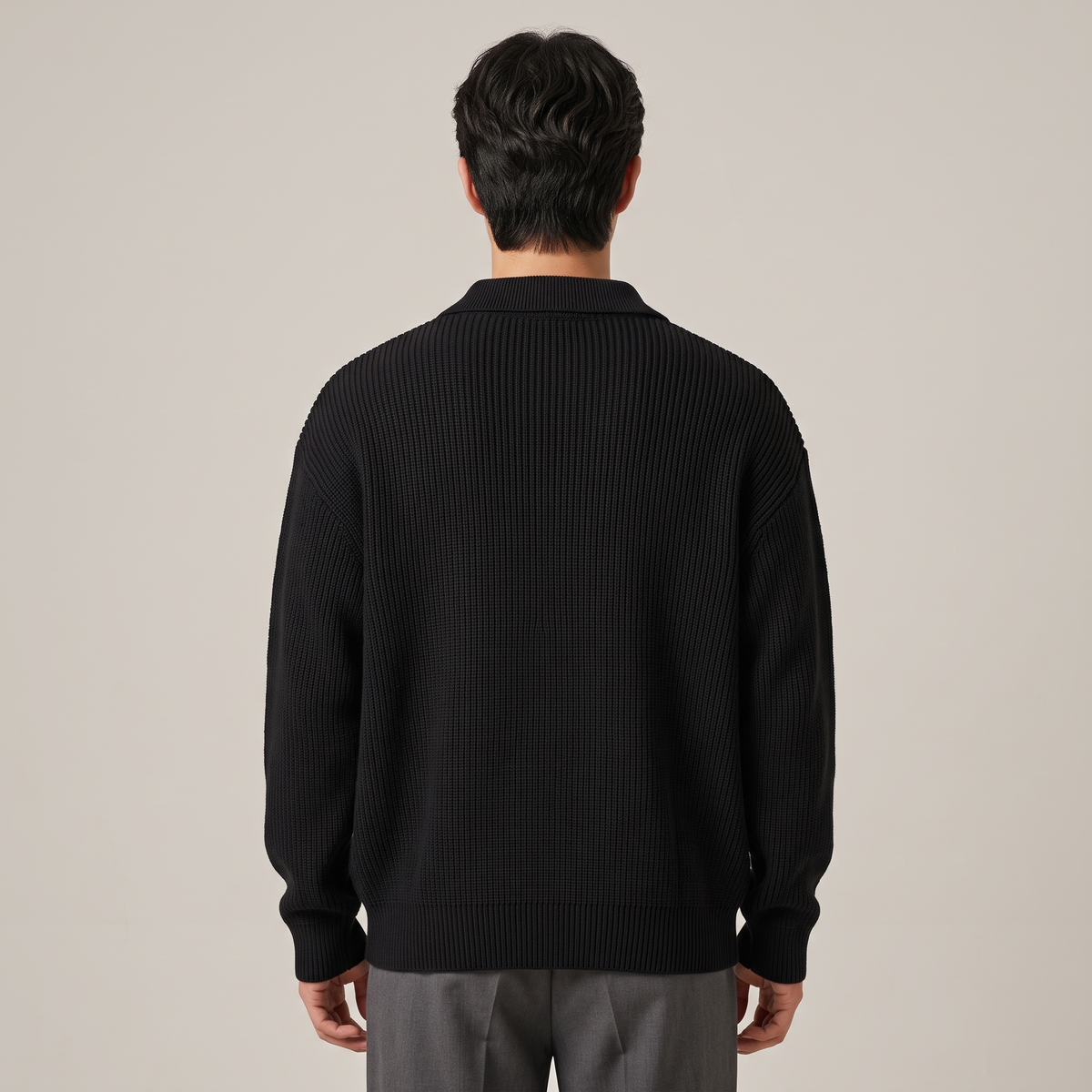 Back view of the relaxed-fit half-zip jumper in black