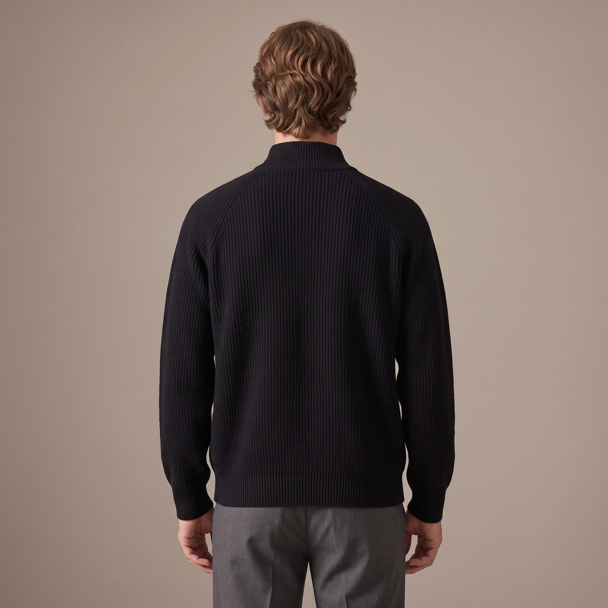 Back view of the full-zip wool cardigan in black
