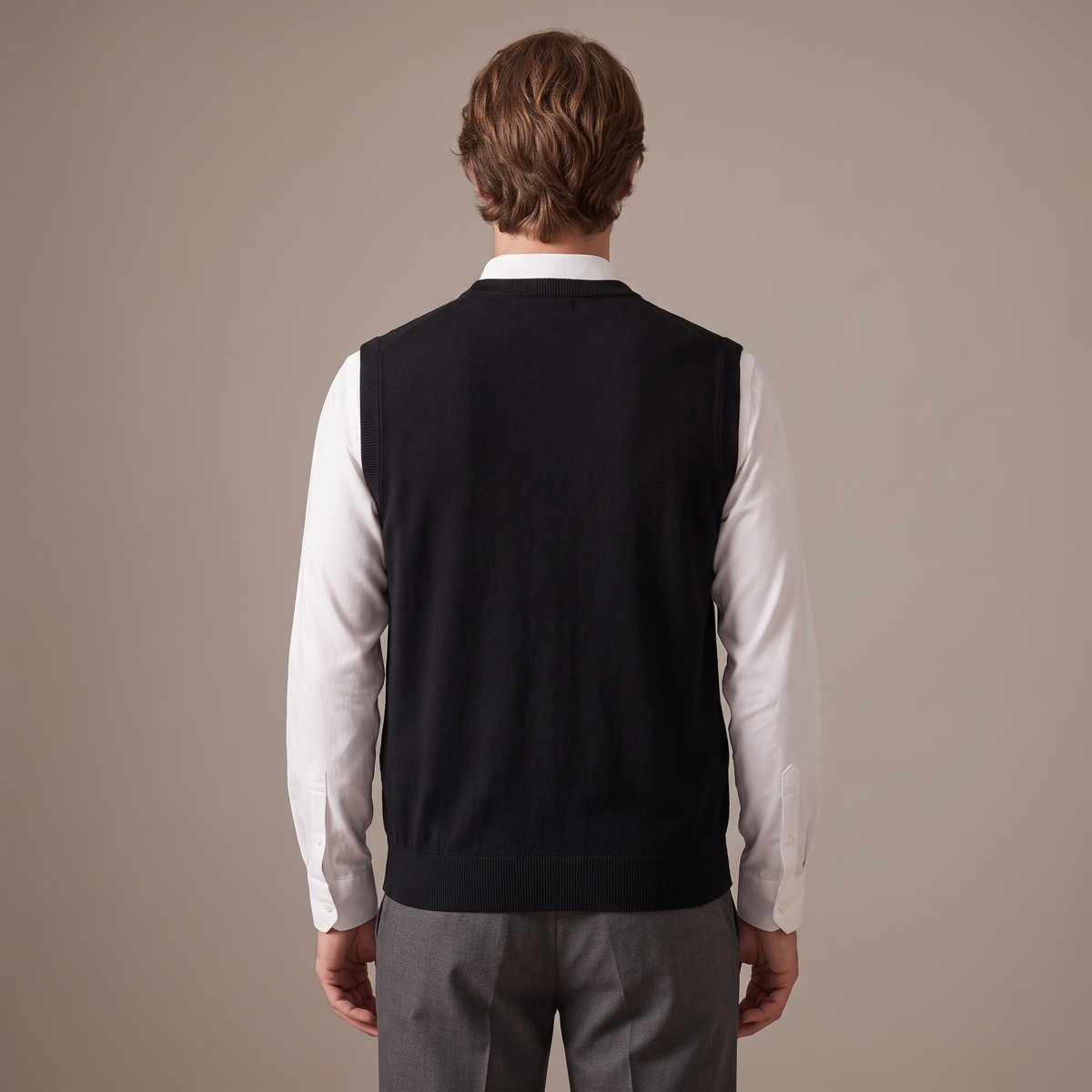 Back view of the knitted vest in black