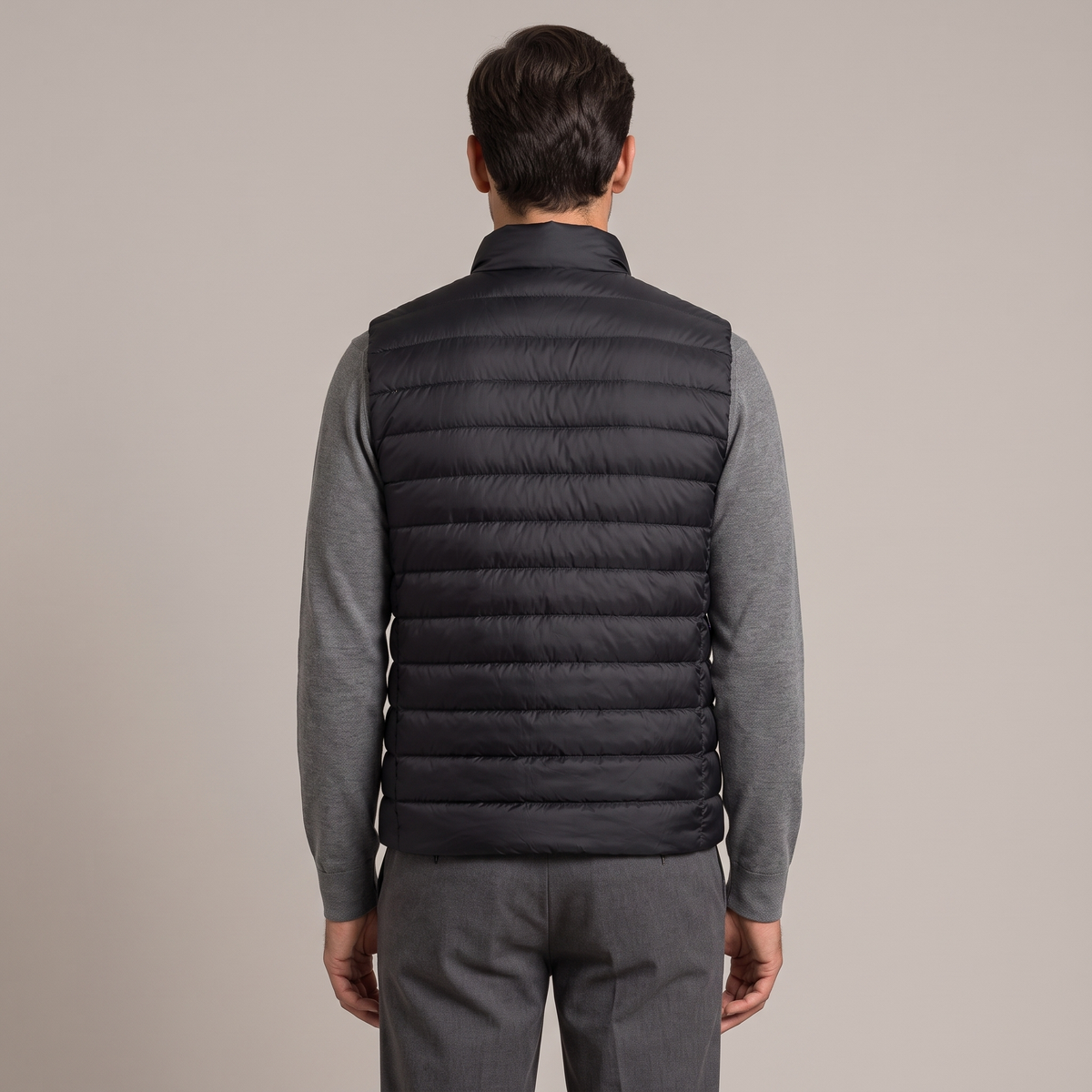 Back view of the down gilet in black