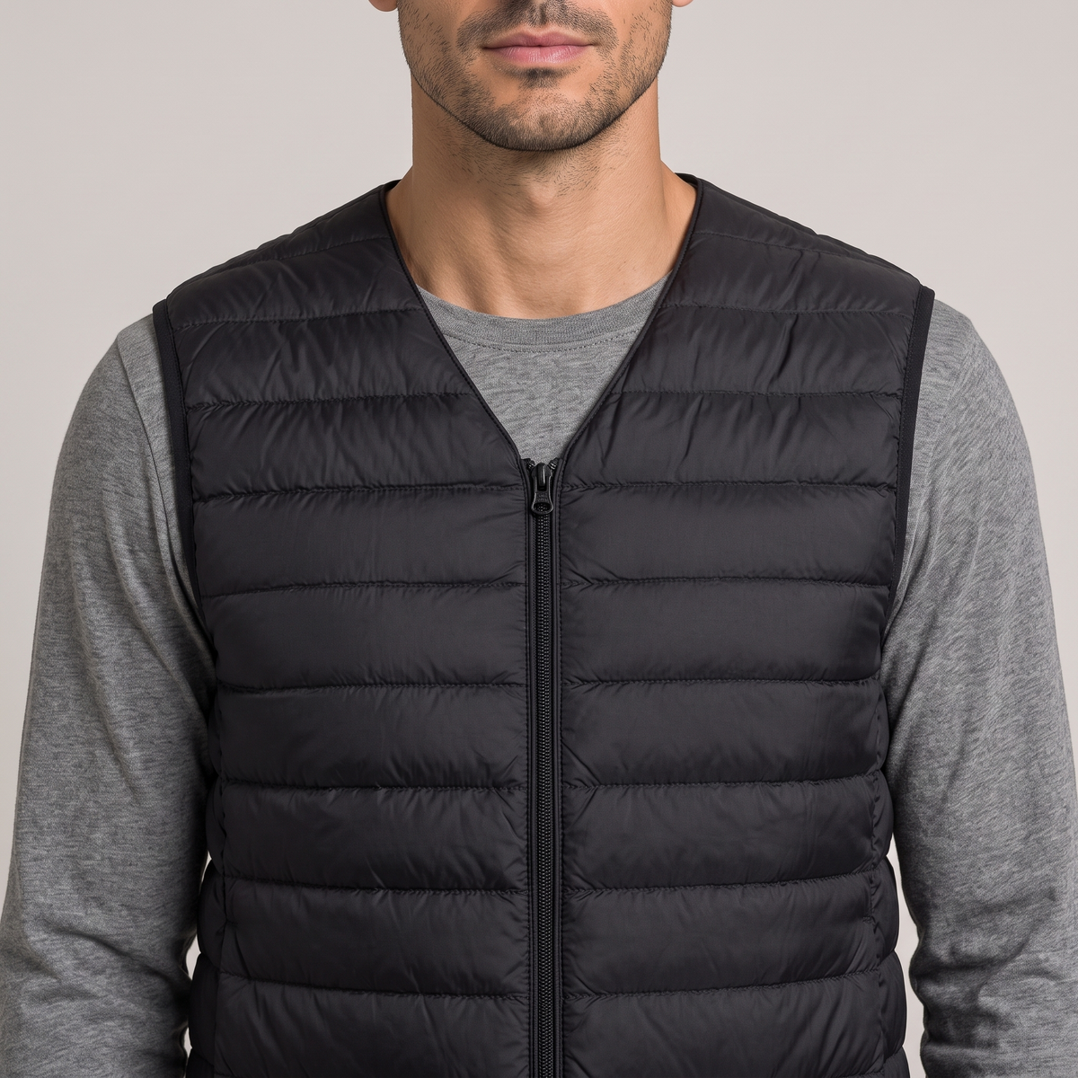 Close-up of the zip and quilted channels, in black