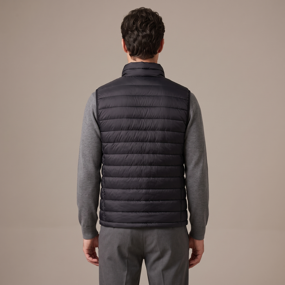 Back view of the down gilet in black