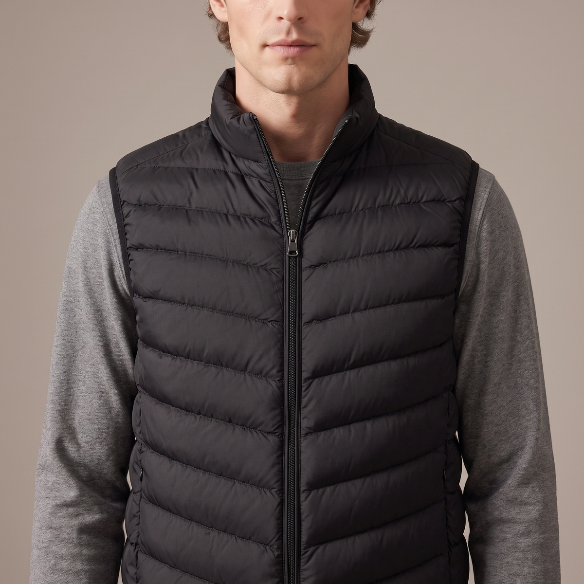 Close-up of the stand collar, zip and quilting, in black