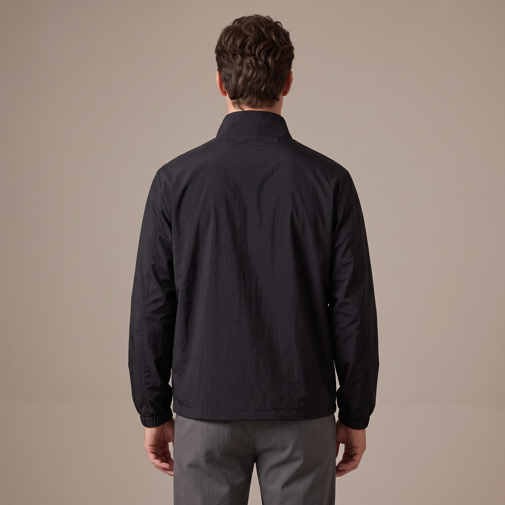 Back view of the windbreaker jacket in black