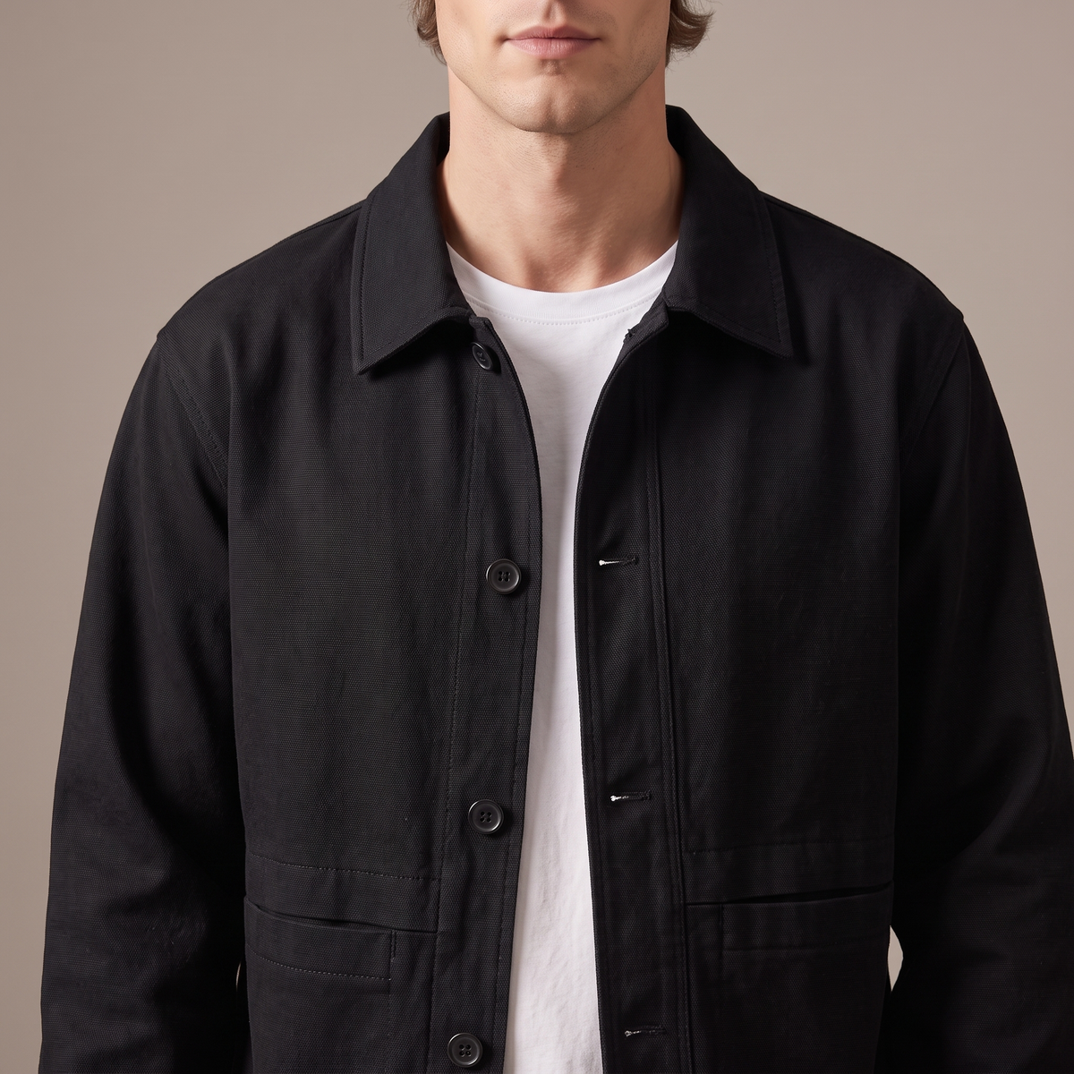 Close-up of the lapel collar and buttons, in black