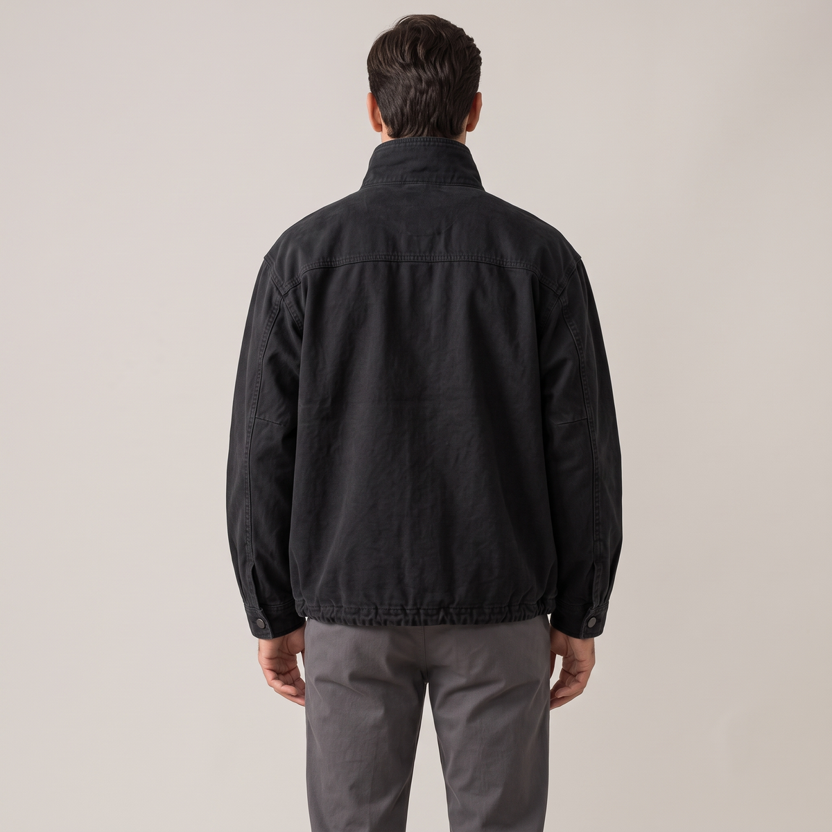 Back view of the workwear jacket in black