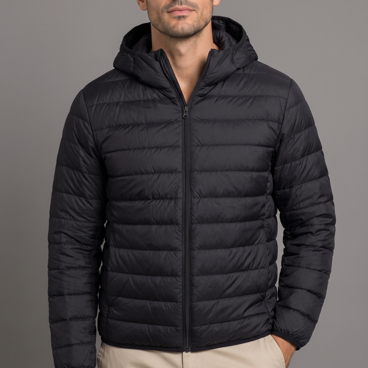 Close-up of the hood, zip and quilting, in black