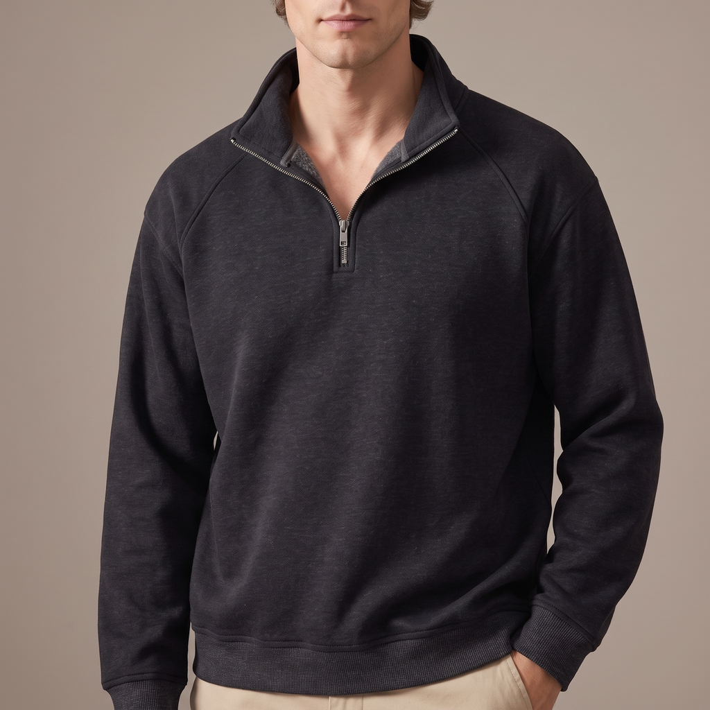 Close-up of the stand collar and half zip, in charcoal