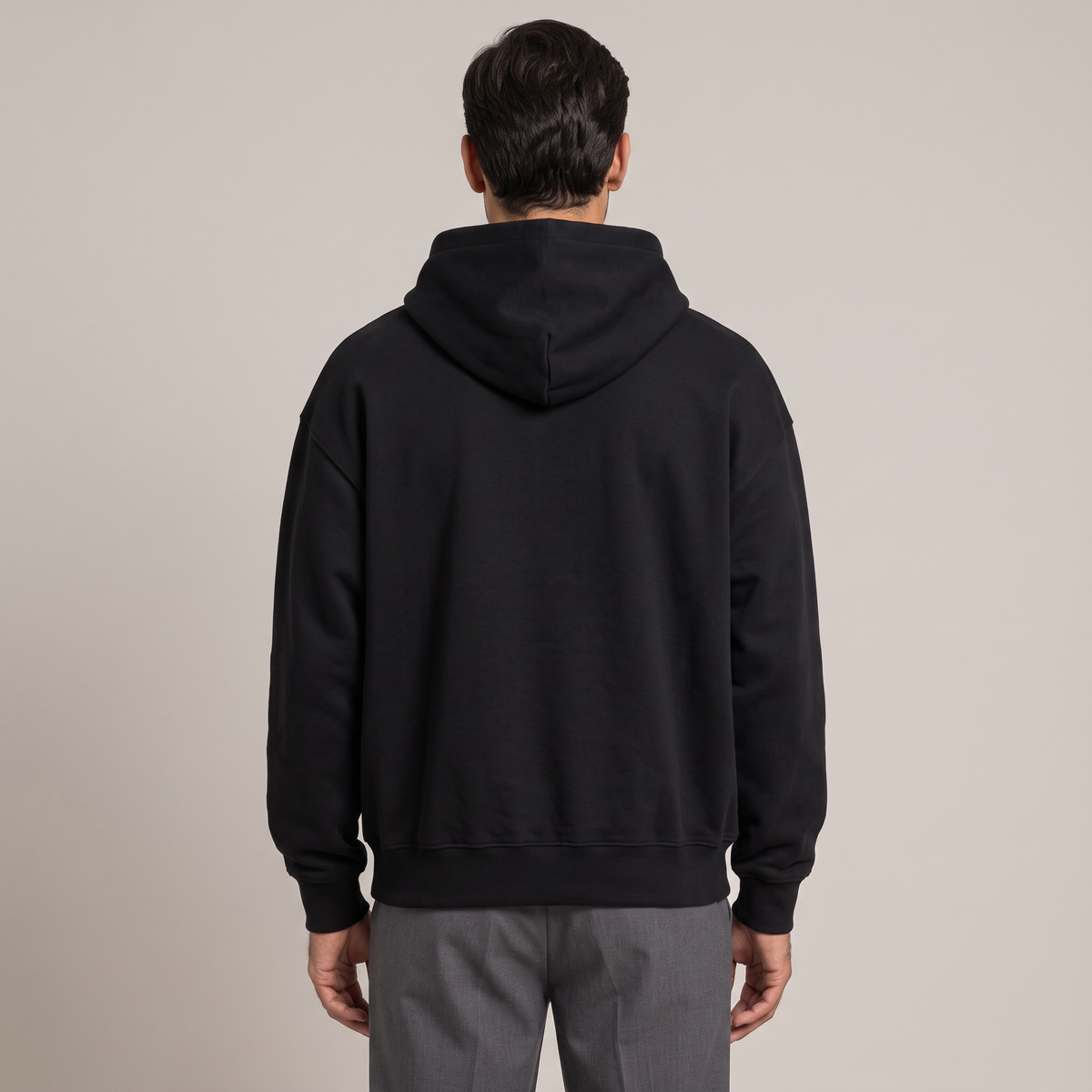 Back view of the boxy hoodie in black