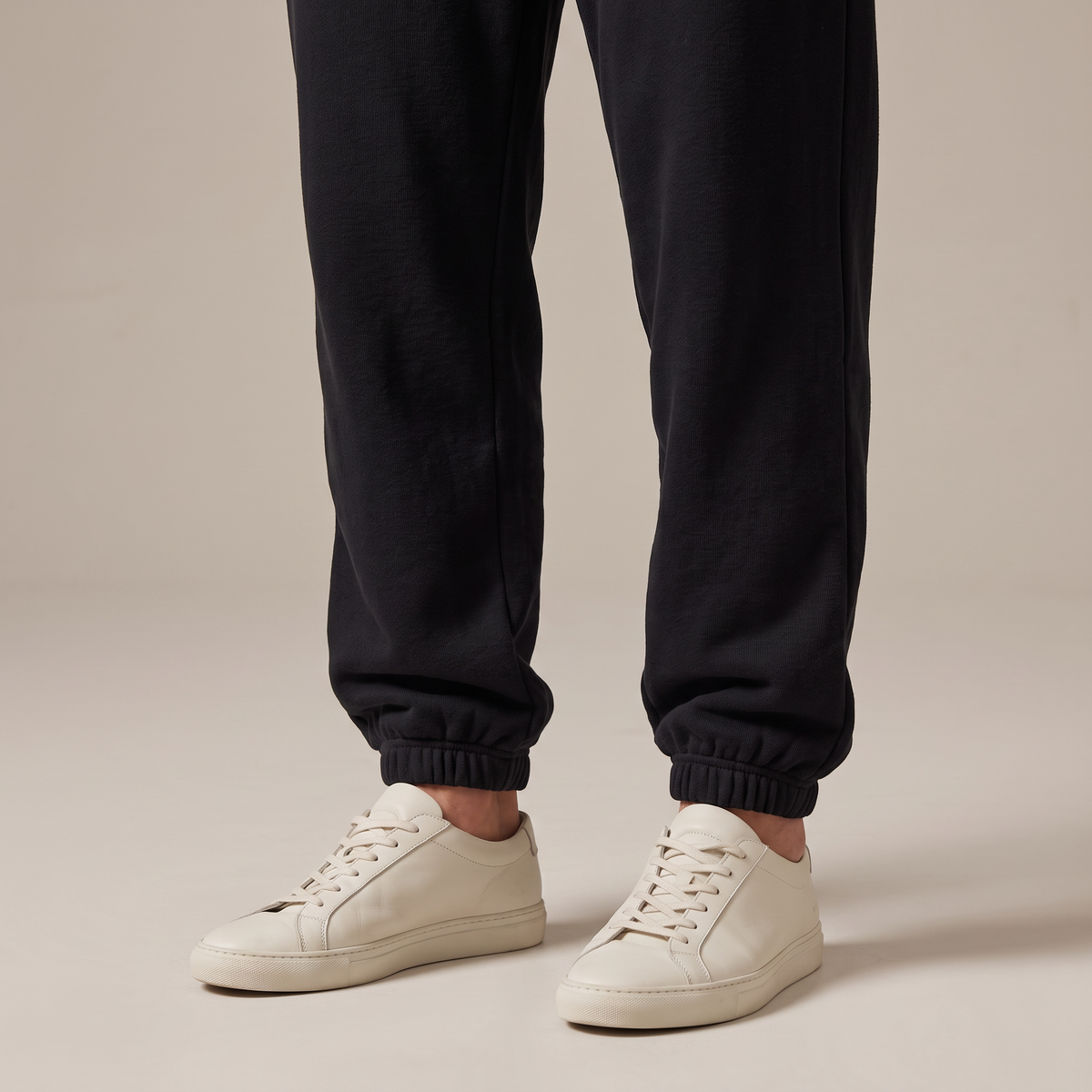 Close-up of the ribbed ankle cuffs, in black