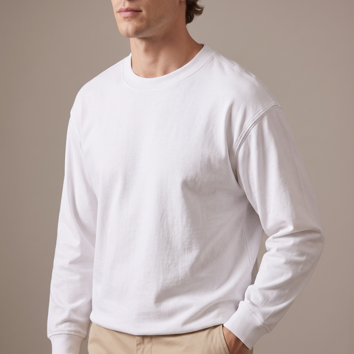 Close-up of the ribbed crew neck and triple stitching, in white