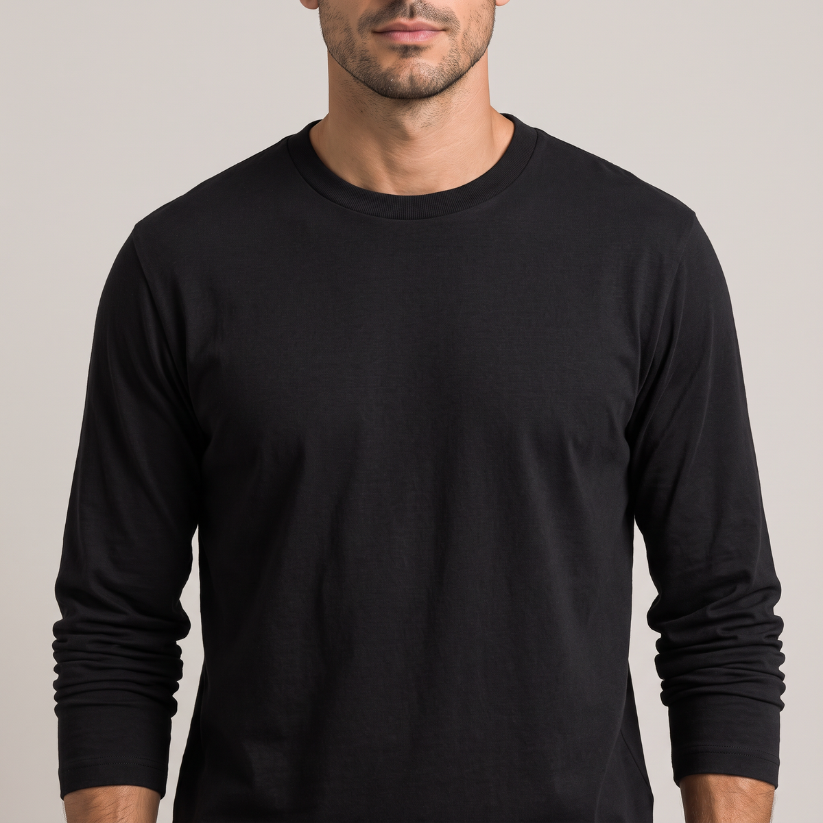 Close-up of the ribbed crew neckline and fine jersey, in black