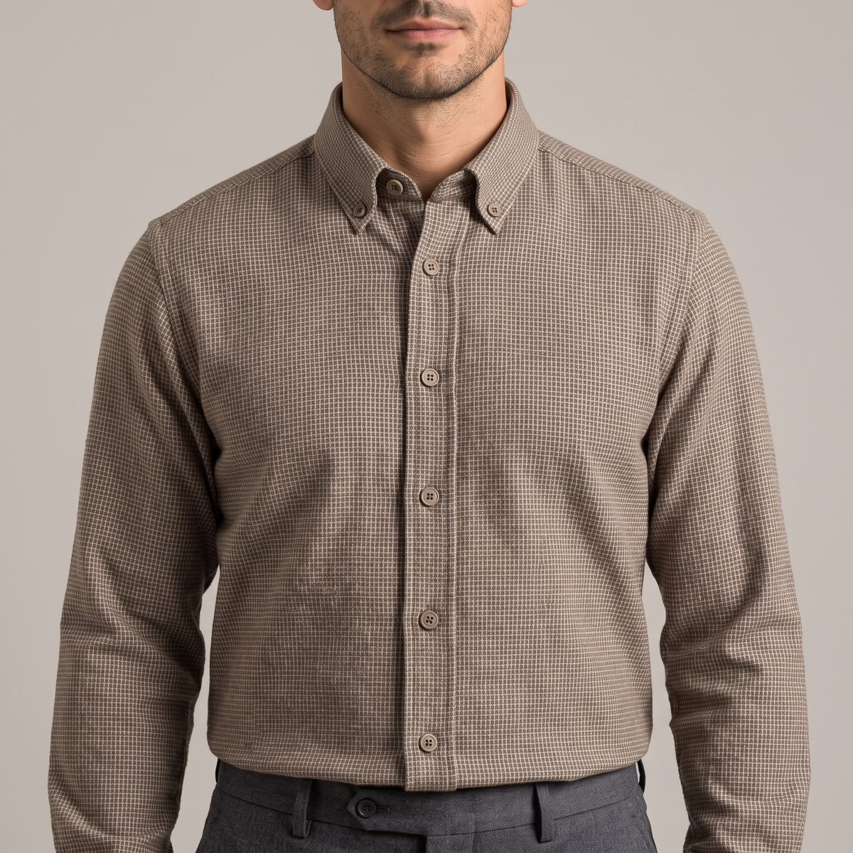 Close-up of the woven houndstooth and placket, in brown