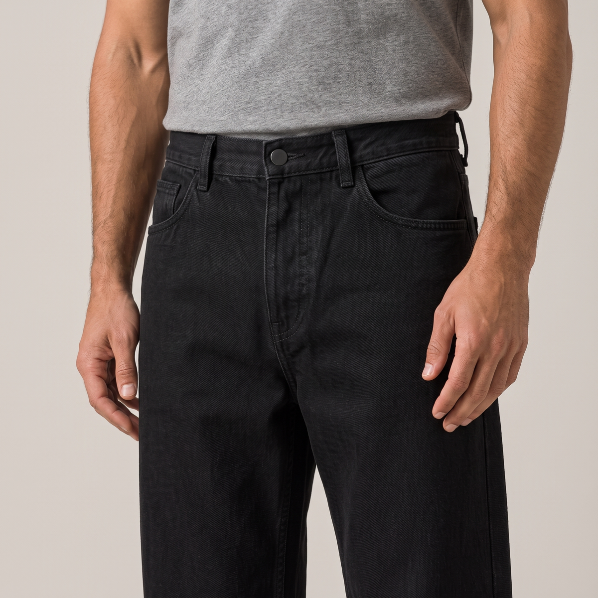 Close-up of the waistband, fly and front pocket, in black