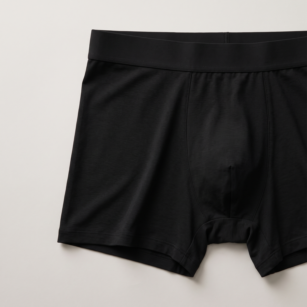 Close-up of the seamless modal knit and waistband, in black