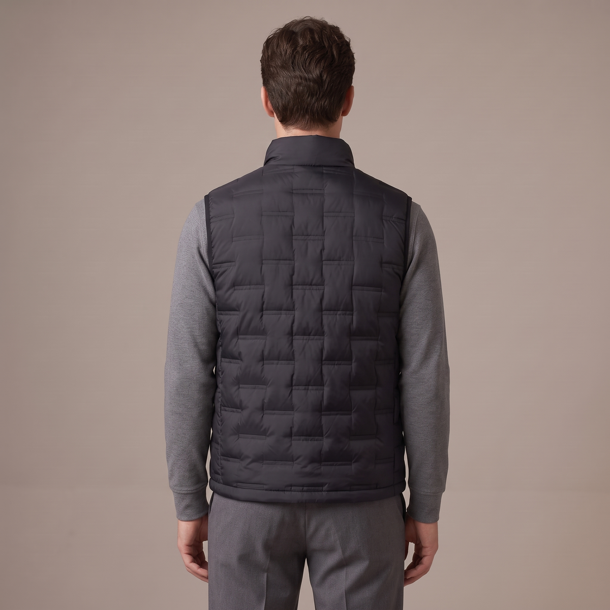 Back view of the reversible down gilet in black
