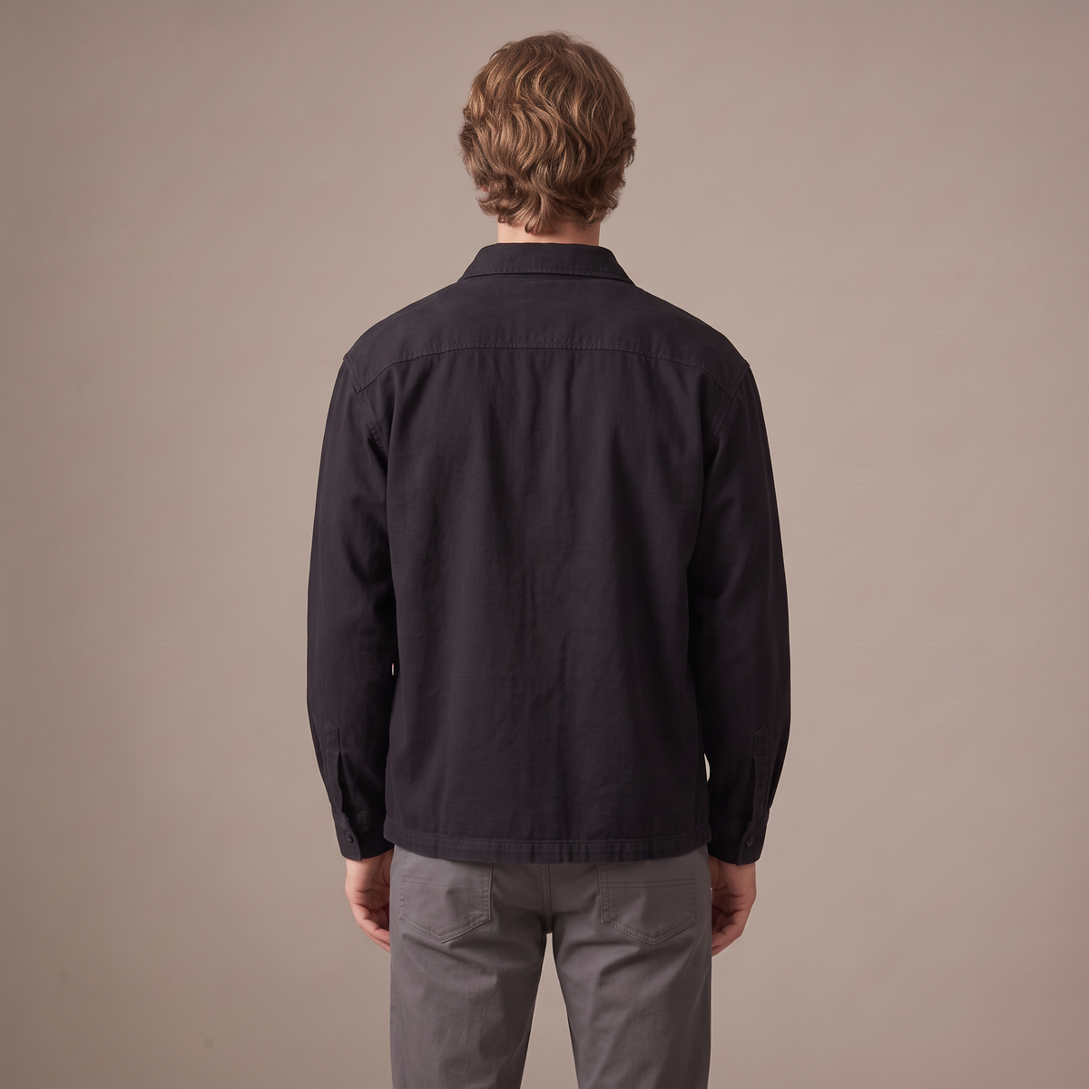 Men's washed cotton overshirt in black, back view