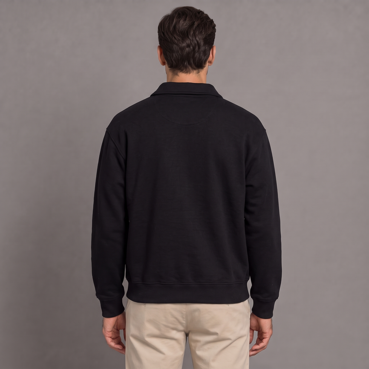 Men's quarter zip sweatshirt in black, back view