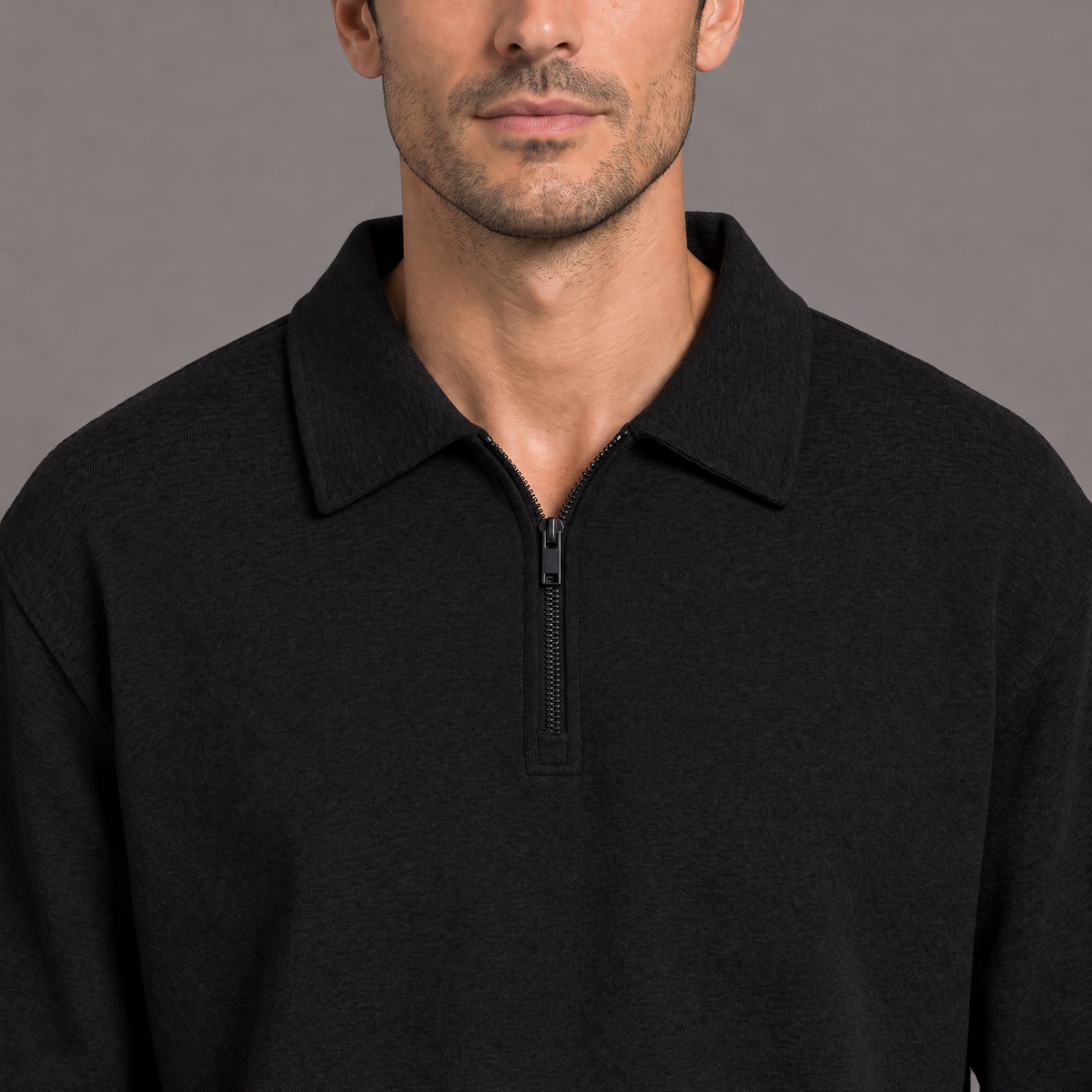 Men's quarter zip sweatshirt in black, collar and zip detail